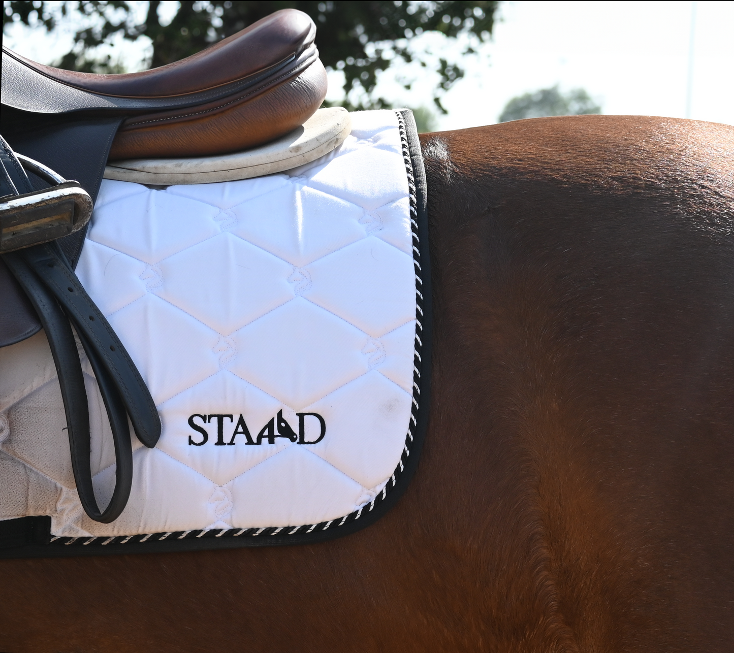 Champion White Dressage Saddle Pad with Embroidered Flag Patch